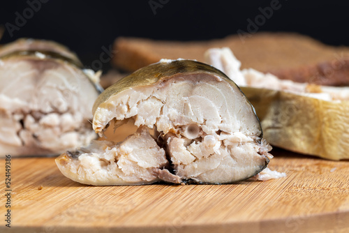 cut into pieces of smoked mackerel during cooking