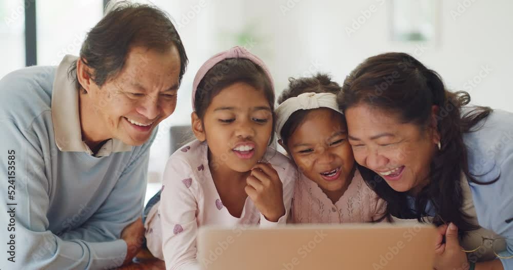 Fun, goofy and playful family selfie on a tablet with grandparents, grandchildren and little girls. Asian children, sisters and siblings having fun, goofing around and making silly face expressions Fun, goofy and playful family selfie on a tablet with grandparents, grandchildren and little girls. Asian children, sisters and siblings having fun, goofing around and making silly face expressions