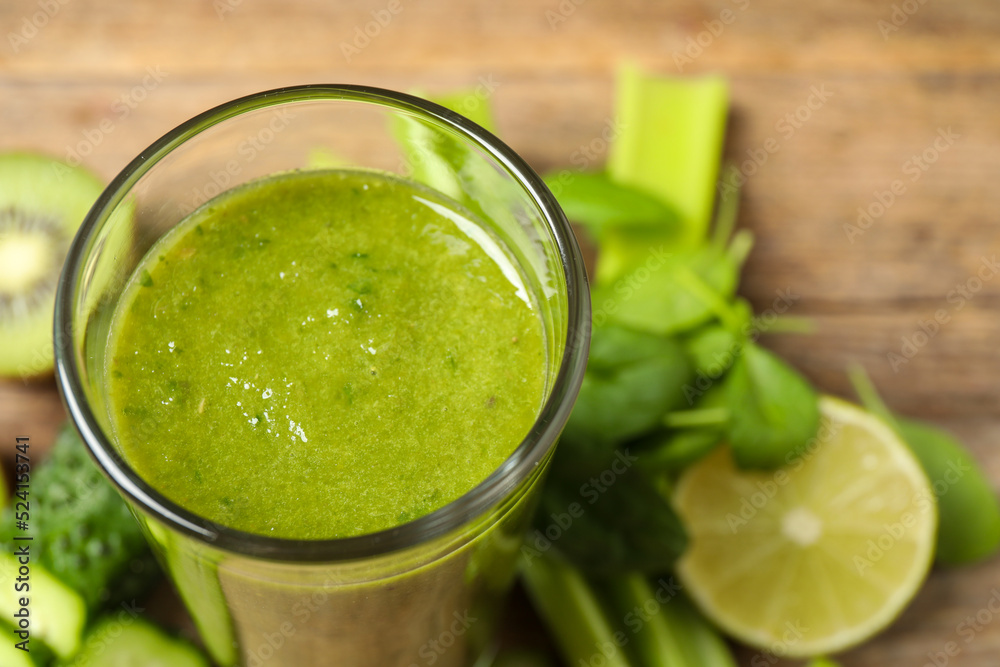 Delicious fresh green juice in glass, closeup Delicious fresh green juice in glass, closeup