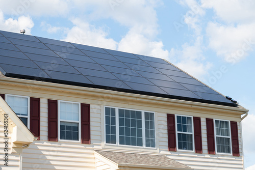 Solar photovoltaic panels on a house roof