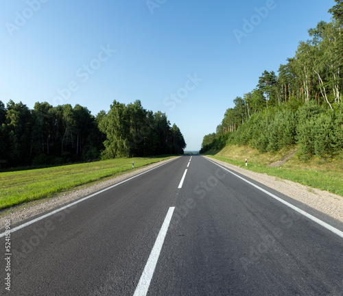 Paved highway with plants