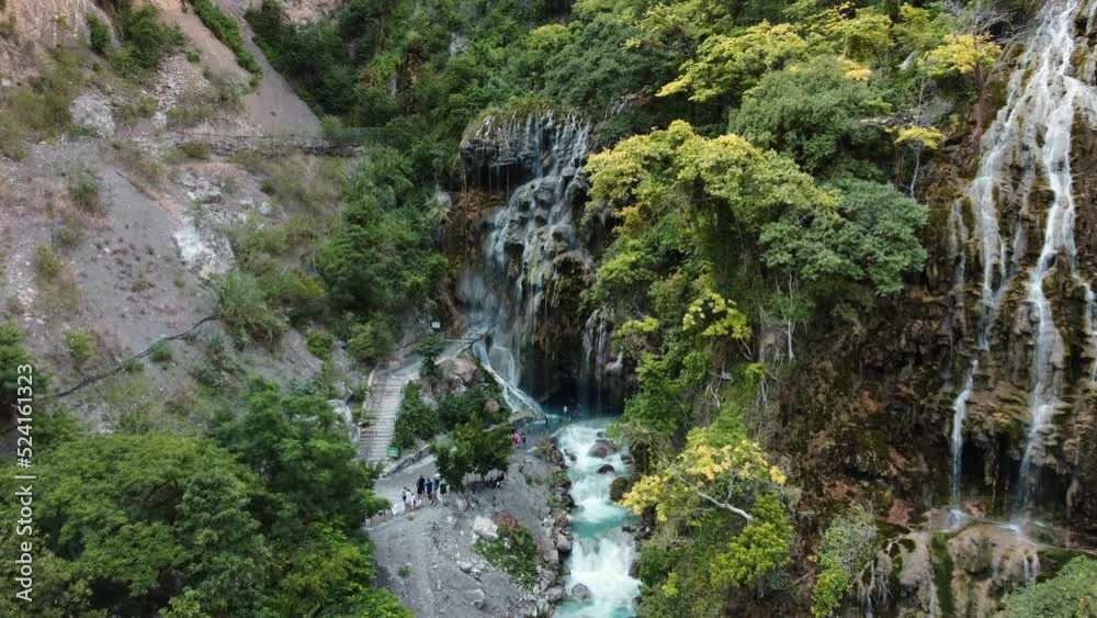 Flying Towards Tolantongo Grutas Amazing Waterfalls Flowing From Mountain Valley, Hidalgo, Mexico Flying Towards Tolantongo Grutas Amazing Waterfalls Flowing From Mountain Valley, Hidalgo, Mexico