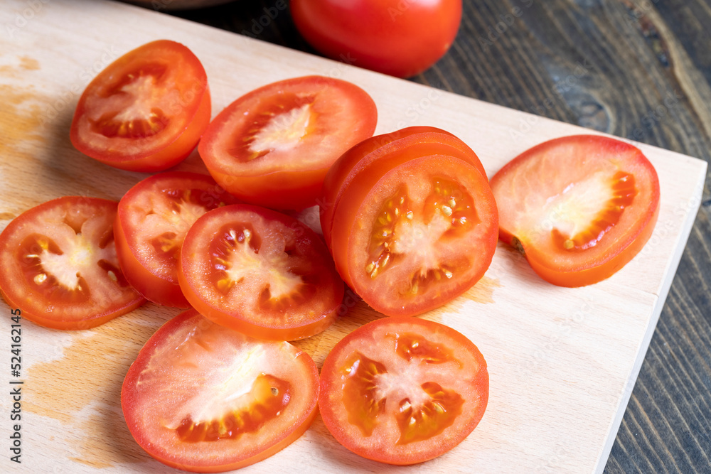 delicious fresh tomato cut into chunks on the table delicious fresh tomato cut into chunks on the table