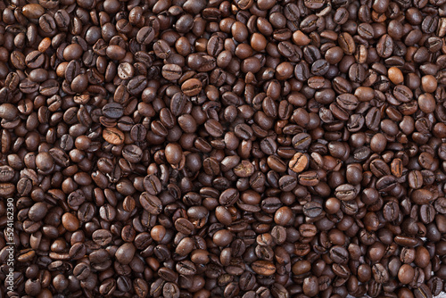 Roasted coffee beans background. High quality photo