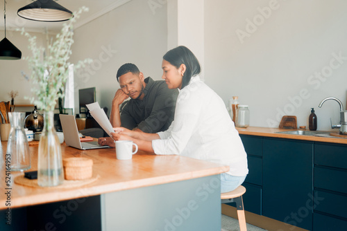 Couple looking at documents, finances and paperwork with confused expression for their overdue budget, credit or house expenses. Managing household spending, saving and account to pay money.
