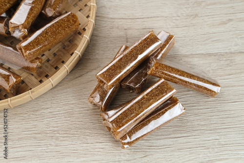 Jenang, a typical dodol snack from Kudus, it tastes sweet. Made from glutinous rice flour mixed with coconut milk, sugar. photo