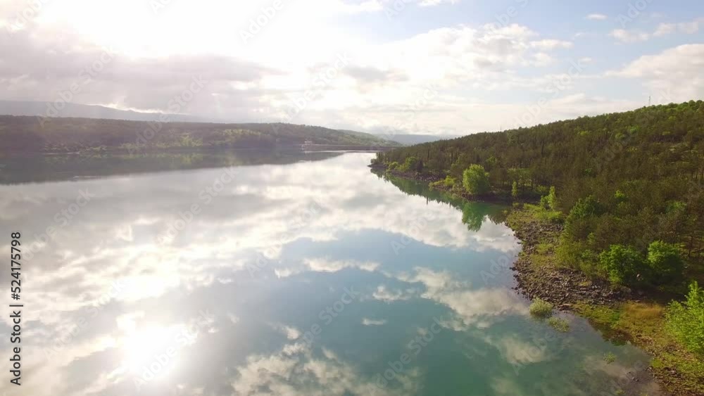River and green nature, sky full of clouds. River and green nature, sky full of clouds.
