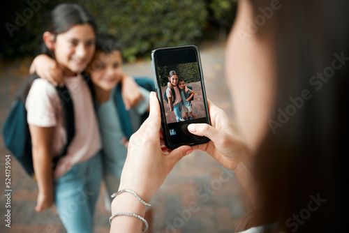 Canvastavla Children first day of school and mother taking photos with a phone of her cute kids