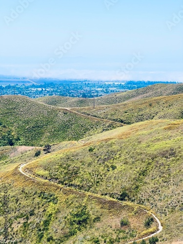 ventura hillsides with the city and the pacific ocean in the background.