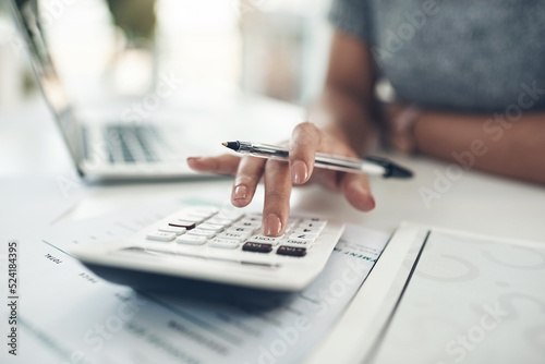 Finance planning, budget or savings manager calculating expenses, taxes or company profits with laptop, paperwork or calculator. Closeup hands of female financial leader checking office staff payroll