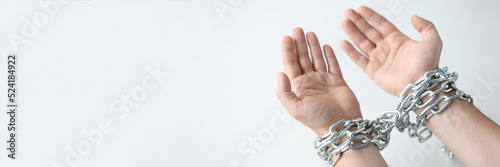 Man hands are tied with chain on white background