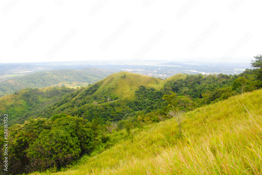 Green hill landscape scenery with breathtaking views over the horizon on a summer day