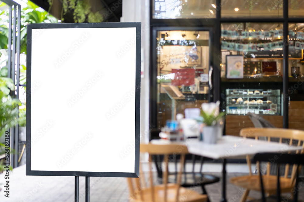 White blank signboard stand near the entrance to the coffee shop, mock up, cafeteria blurred background can inserting the text of the customer. White blank signboard stand near the entrance to the coffee shop, mock up, cafeteria blurred background can inserting the text of the customer.
