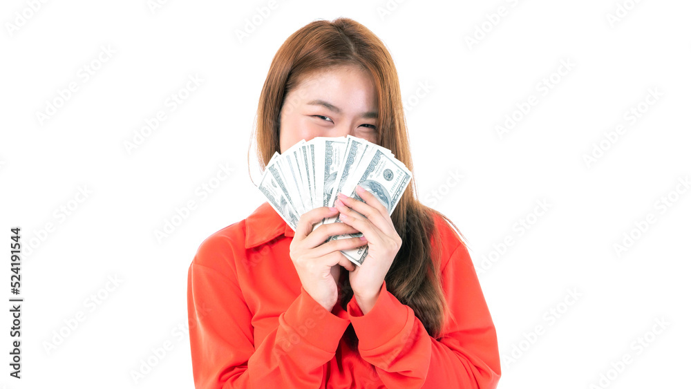 Successful beautiful Asian business young woman holding money US dollar bills in hand isolated on white background , business concept Successful beautiful Asian business young woman holding money US dollar bills in hand isolated on white background , business concept