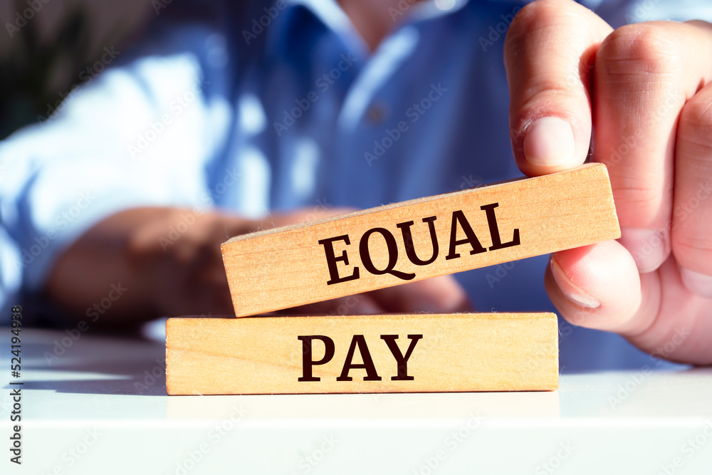Wooden blocks with words 'Equal Pay'. Business concept Wooden blocks with words 'Equal Pay'. Business concept
