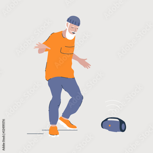 A fancy old man dances a modern dance to music coming from a music speaker.