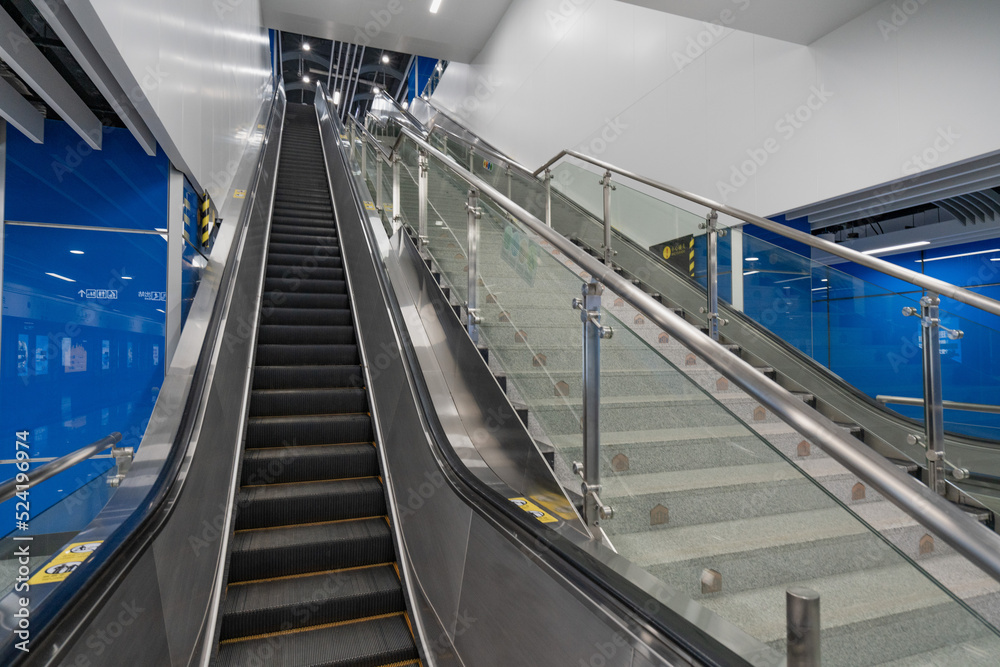 Fototapeta premium Escalator in subway station