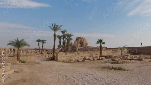 Shot inside the Karnak temple complex without people on a sunny day with clouds, Luxor, Egypt photo