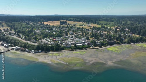 Wide aerial view of a town on Whidbey Island at low tide. photo