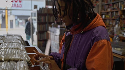 Woman seen running through vinyl records
