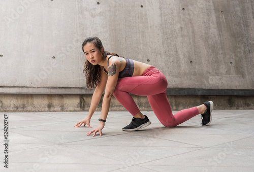 Fototapeta Naklejka Na Ścianę i Meble -  Asian woman exercising for fitness