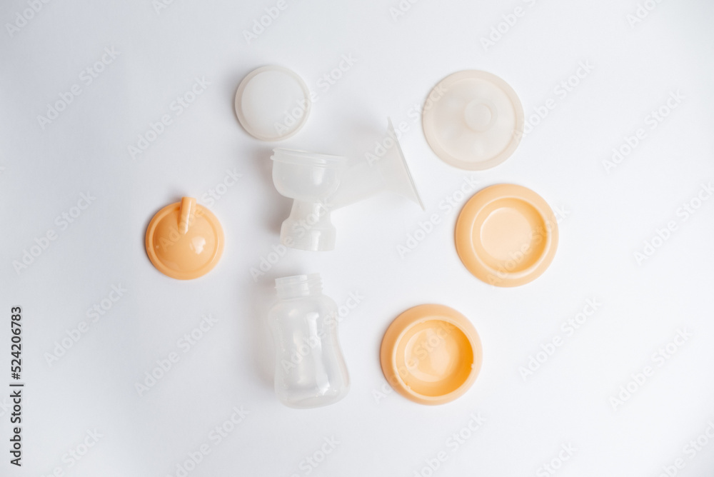Background of automatic breast pump, baby bottle for milk. Mother's breast milk is the healthiest food for a newborn