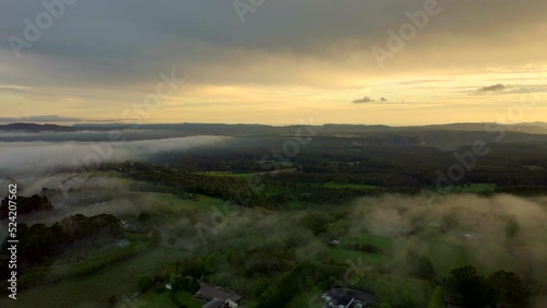 A foggy aerial sunset in Robertson, Southern Highlands NSW photo
