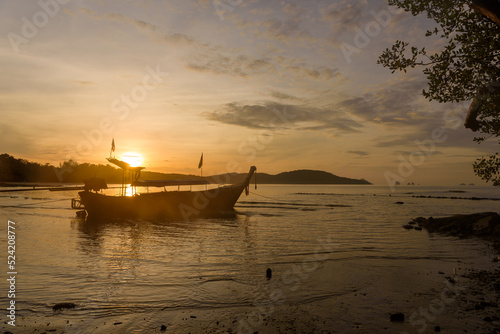 Sunrise over Andaman Sea with high tide, South of Thailand, sunset at the beach
