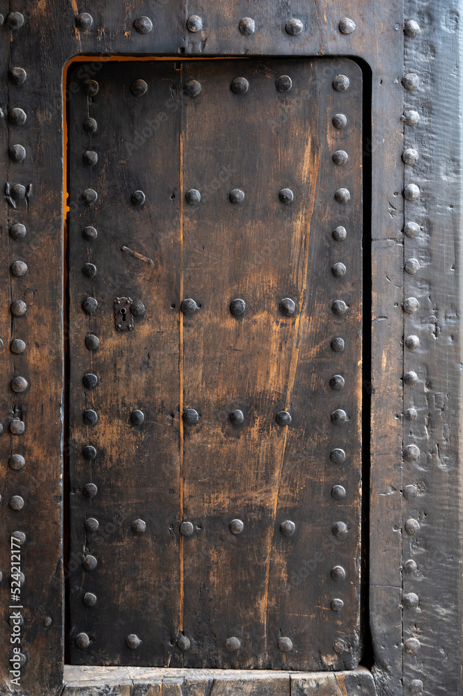 Example of medieval geometrical ornaments on wooden doors in Granada, Andalusia, Spain