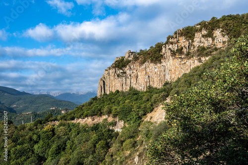 mountain gorge with a steep road and a funicular line in the mountains of Armenia © константин константи