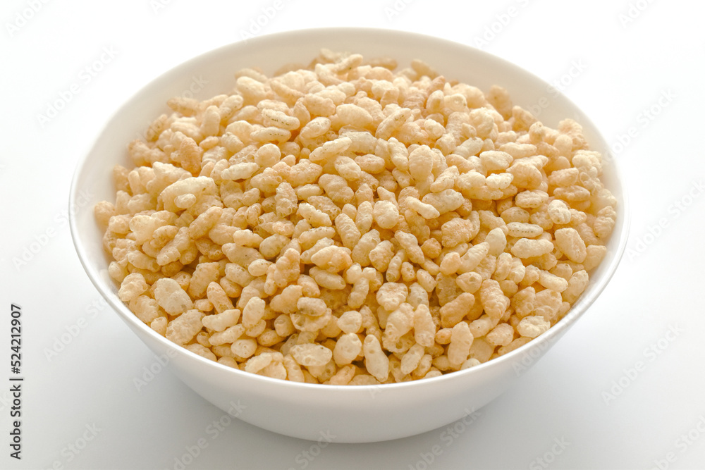 Crispy rice cereal in a white bowl. Crispy rice cereal in a white bowl.