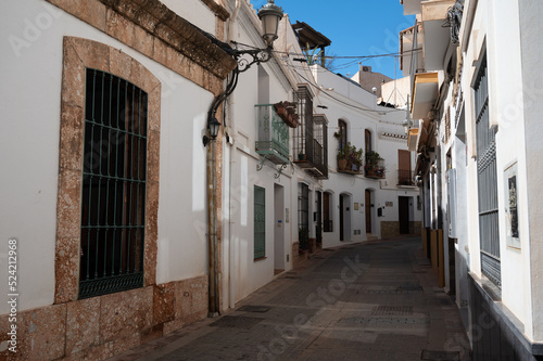 Fototapeta Naklejka Na Ścianę i Meble -  Travel destination, small Andalusian town Nerja with white houses and narrow streets on Costa del Sol, Spain