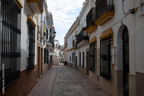 Fototapeta Naklejka Na Ścianę i Meble -  Travel destination, small Andalusian town Nerja with white houses and narrow streets on Costa del Sol, Spain