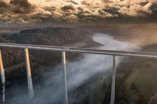 aerial view of a  highway bridge in the sunrise 