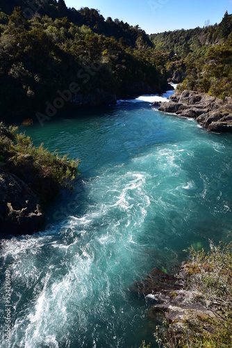 Fast flowing waters of Waikato River at Aratiatia Rapids. Location: Taupo New Zealand