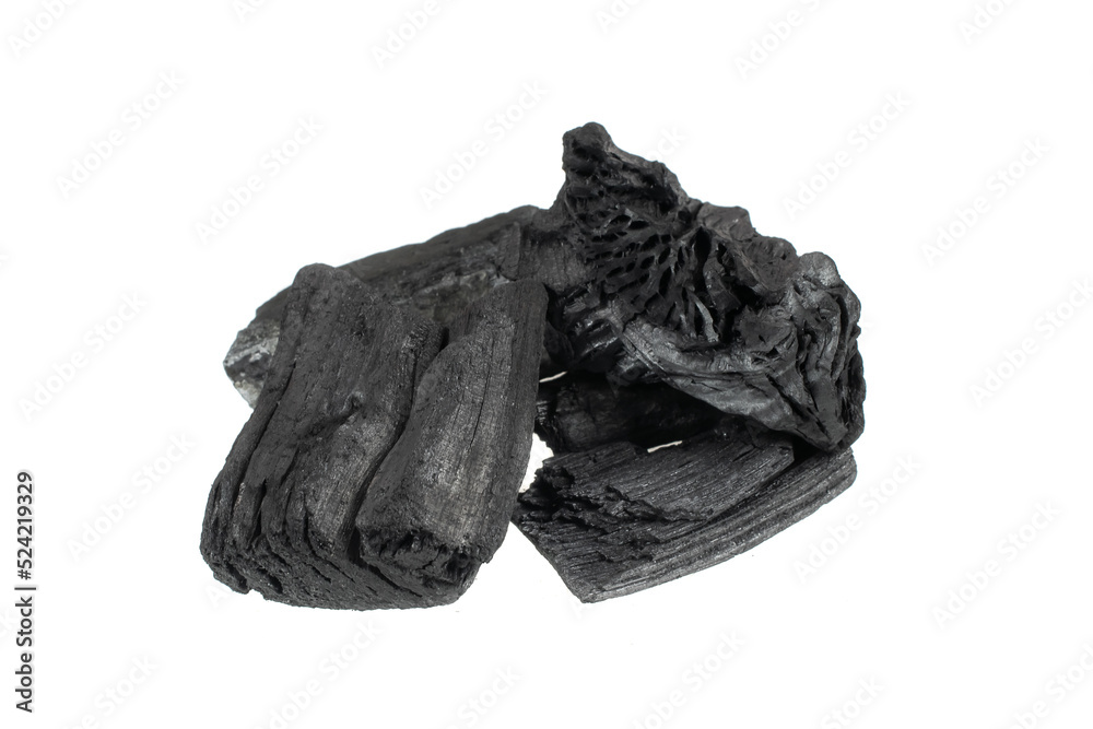 pieces of charcoal on a white isolated background