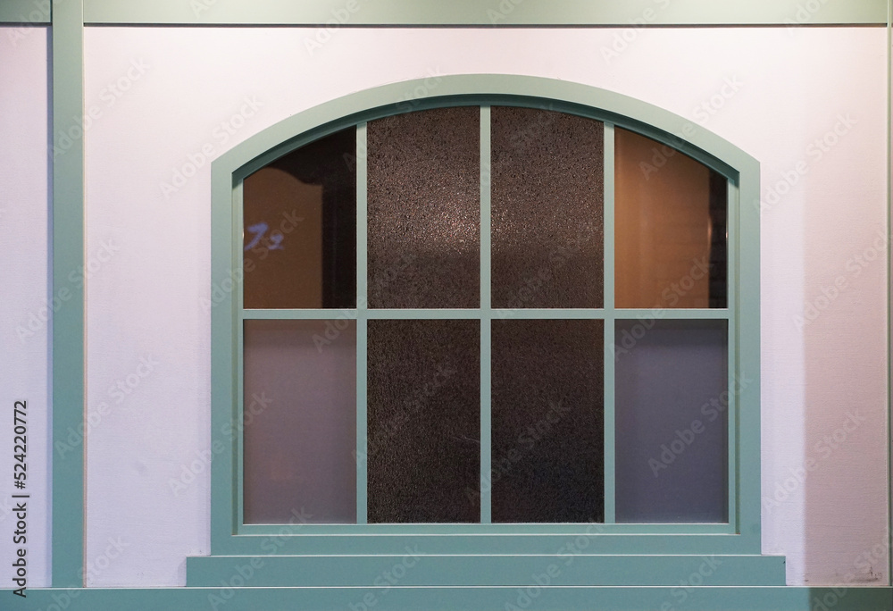 Windows in the form of arches on the walls of the room Windows in the form of arches on the walls of the room