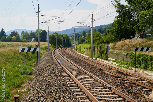 Landscape with railroad, blue sky in summer. Transportation