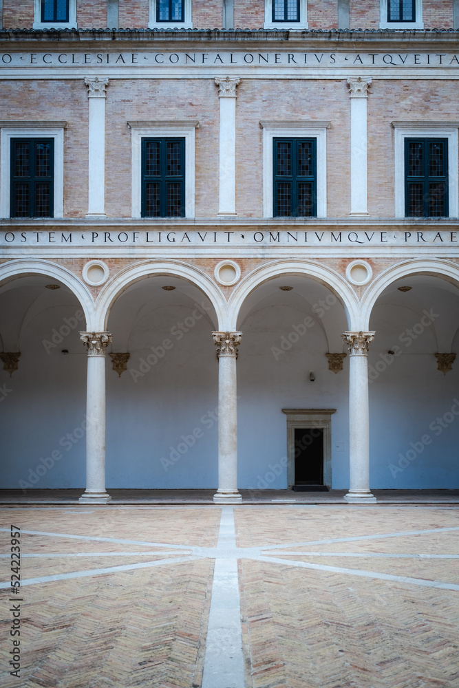 Urbino, detail of the internal courtyard of the ducal palace.