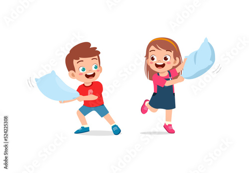 little kid play pillow fight with friend
