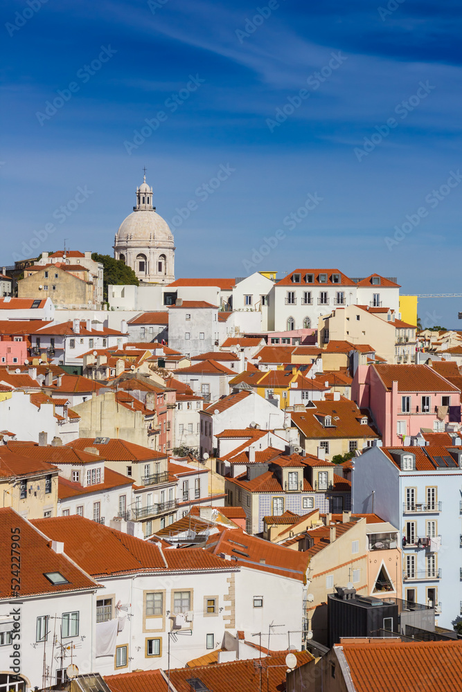 Colorful houses and the dome of the Santa Engracia church in Lisbon, Portugal