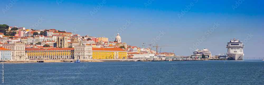 Panorama of a cruise ship in the historic city center of Lisbon, Portugal