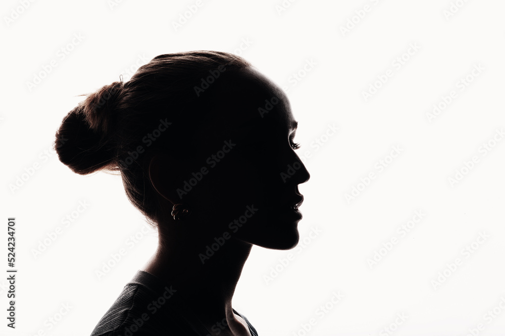 Young woman silhouette beautiful profile portrait isolated.