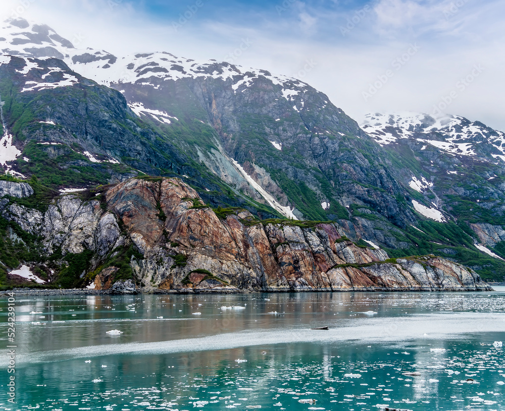 A view from the Margerie Glacier along the sides of Glacier Bay, Alaska in summertime