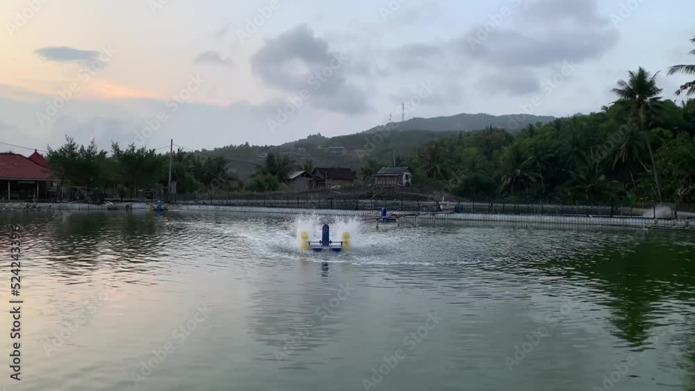 Water turbines spinning and increase oxygen in tub for shrimp farm Water turbines spinning and increase oxygen in tub for shrimp farm