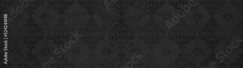 Old black anthracite gray retro vintage arabesque wallpaper tile wall texture background banner panorama with seamless floral flowers leaves print pattern.