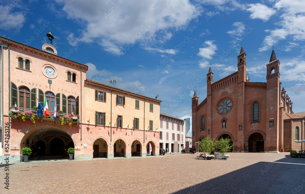 Cathedral of San Lorenzo and the town hall with historic buildings in Piazza Duomo in Alba, Langhe, Piedmont, Italy
