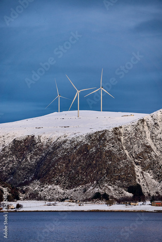 Haramsøya with wind farm turbines on top of its mountain, Ålesund, Møre og Romsdal, Norway. photo