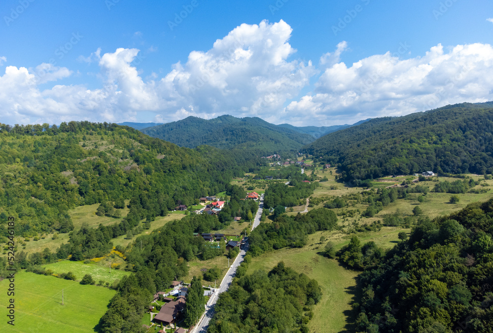 Aerial landscape of a rural area between the hills