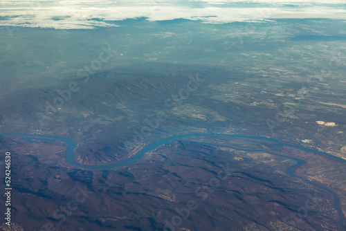 Aerial view of Alps and Danube . Flying over the mountains and river